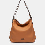 Bolso multifuncional en materiales reciclados cognac