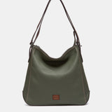 Bolso multifuncional en materiales reciclados verde