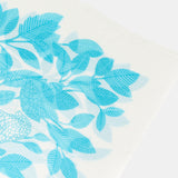 Pañuelo de viscosa con estampado natural en tonos turquesa