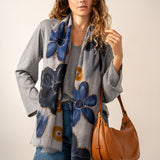 Wool scarf with a gray floral print.