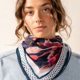 Silk bandana with blue floral print.