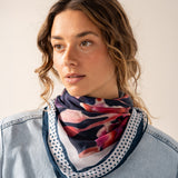 Silk bandana with blue floral print.