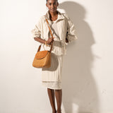 Bandolera en piel y serraje cognac