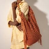 Orange macramé shoulder bag